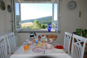 Ferienwohnungen im Erzgebirge mit Blick auf den Klinovec (Keilberg)